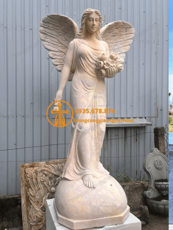 tuong nu thien than om hoa bang da cam thach vang